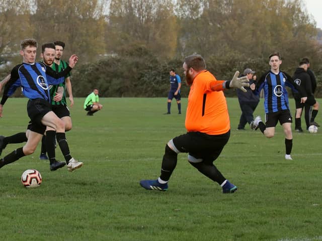 Padnell (blue/black) v AFC Fairfields Reserves. Picture by Kevin Shipp
