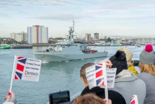 Families and spectators gather at the Round Tower, Old Portsmouth to watch HMS Medway departing from Portsmouth in January.
Picture: Habibur Rahman
