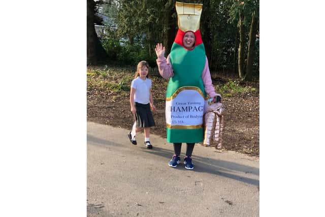 Sarisbury mum Sarah Denford and her fancy dress outfit has brightened the day for parents sad to see their children return to school. Picture: Sarah Denford