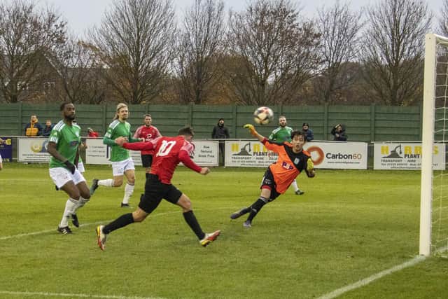 Jack Breed heads the only goal for Fareham against Hythe. Picture by Ken Walker