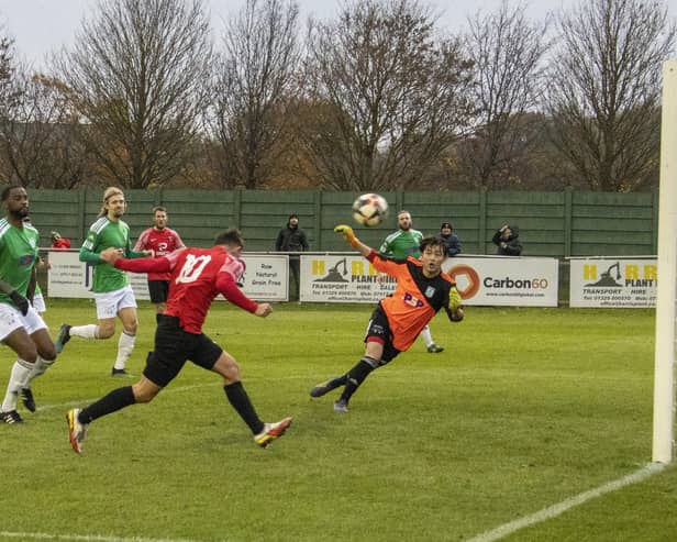 Jack Breed heads the only goal for Fareham against Hythe. Picture by Ken Walker