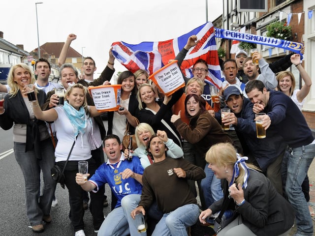 Jubilant celebrations as Pompey fans spill out onto the streets of Highland Road, Southsea, after watching their team win the Cup Final at WembleyPICTURE: MICHAEL SCADDAN