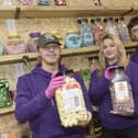 Owner's Grace Inns, Isaac White and volunteer Archie show some of the sweets on offer at Jolly Jellies.  Picture: Sarah Standing (101224-7564)