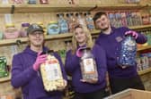 Owner's Grace Inns, Isaac White and volunteer Archie show some of the sweets on offer at Jolly Jellies.  Picture: Sarah Standing (101224-7564)