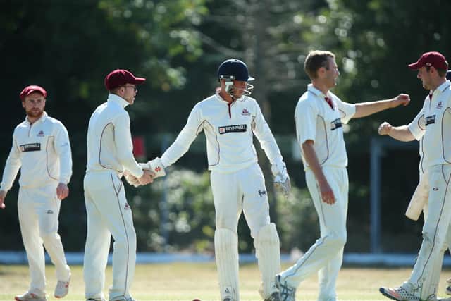 Portsmouth & Southsea celebrate Brad Mengham's wicket during their Southern Premier League Cup hammering of Purbrook. Picture: Chris Moorhouse