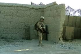 Dan Arnold, pictured in Afghanistan, said he struggled to find his feet in the working world after leaving the military almost 10 years ago.