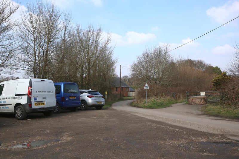 Film crews at the entrance to Little Woodham Village in February 2018, while filming of Doctor Who took place.