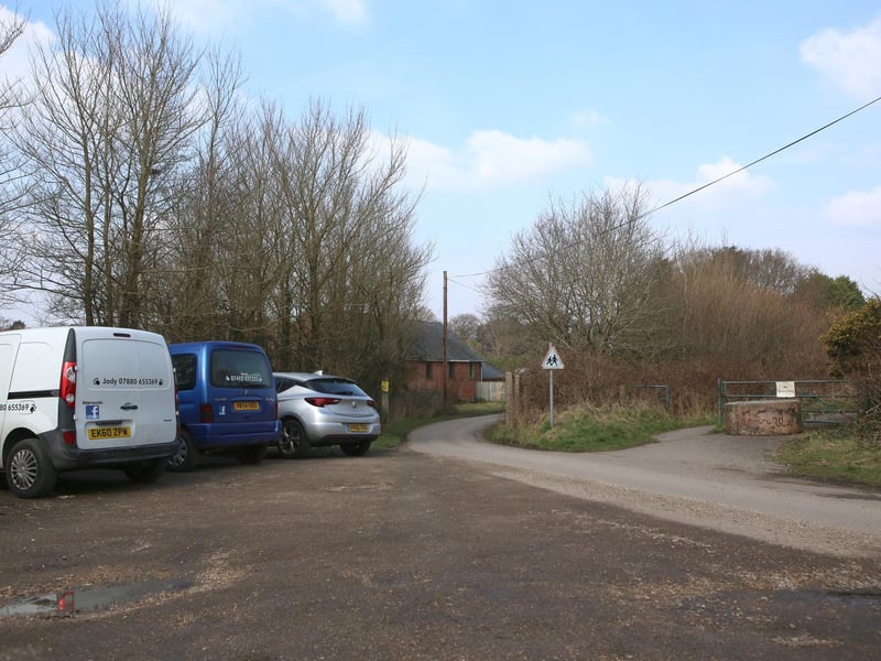 Film crews at the entrance to Little Woodham Village in February 2018, while filming of Doctor Who took place.