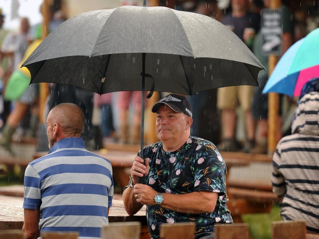 The rain comes down at the Wickham Festival on Thursday, July 31, 2025.   Picture: Sarah Standing (310725-1255)