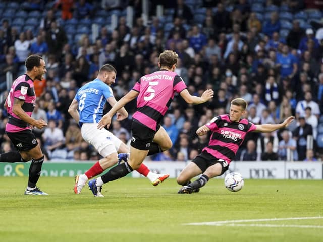 Ryan Tunnicliffe opens the scoring after 120 seconds to give Pompey the lead in their clash with Shrewsbury. Picture: Jason Brown/ProSportsImages