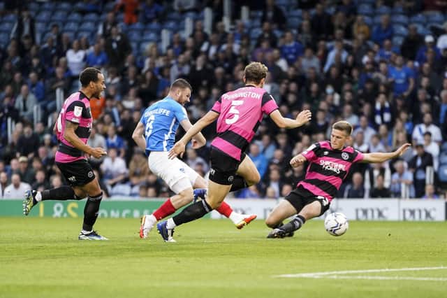 Ryan Tunnicliffe opens the scoring after 120 seconds to give Pompey the lead in their clash with Shrewsbury. Picture: Jason Brown/ProSportsImages