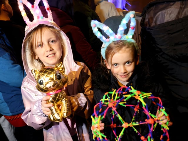 Reggie Lyden, 10, and Ella Lyden, 8, enjoy the Gosport High Street Christmas Lights Switch On.