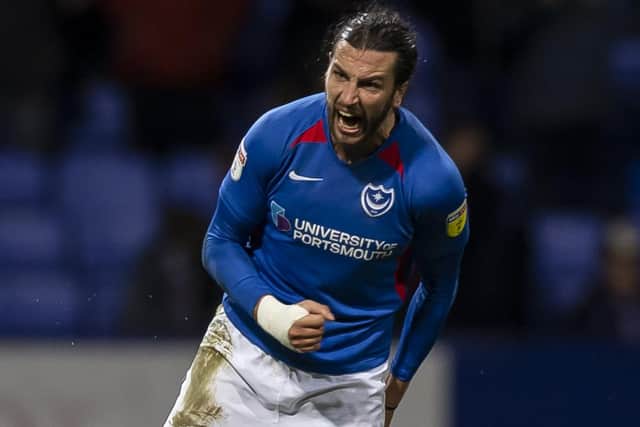 Christian Burgess of Portsmouth celebrates at full time of the Sky Bet League One match between Bolton Wanderers and Portsmouth at the University of Bolton Stadium on January 18th 2020 in Bolton, England. (Photo by Daniel Chesterton/phcimages.com)
