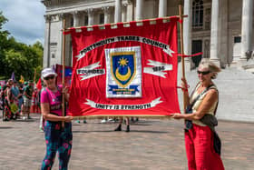 The Portsmouth Trades Coucil banner, carried at the front of the march. Picture: Mike Cooter (200822)