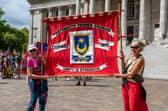 The Portsmouth Trades Coucil banner, carried at the front of the march. Picture: Mike Cooter (200822)