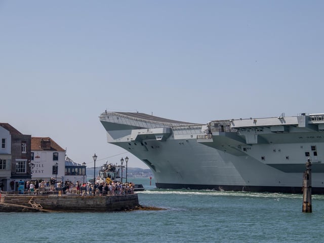 HMS Prince of Wales leaving Portsmouth on Friday 2nd August 2024
Pictured: View of HMS Prince of Wales going past Spice Island
Picture: Habibur Rahman
