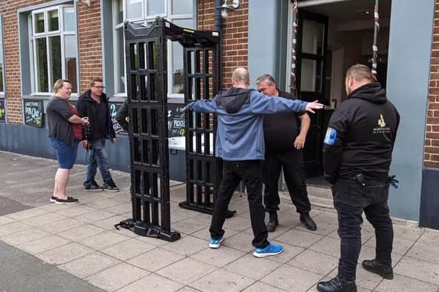 Police search for weapons at pubs. Pic Hants police