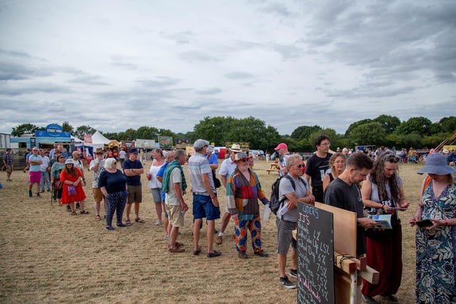 It's thirsty work going to a music festival - the mid-afternoon queue for beer. Picture: Habibur Rahman