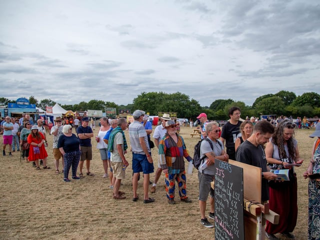 It's thirsty work going to a music festival - the mid-afternoon queue for beer. Picture: Habibur Rahman