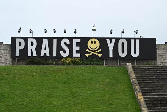 Victorious Festival has dropped a teaser for one of the main headlines for 2024. Castlefield in Southsea has welcomed signage which says 'praise you' indicating that Fatboy Slim (Norman Cook) will be performing next year.
Picture: Keith Woodland