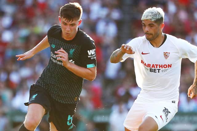 Ben Woodburn of Liverpool dribbles during the first half against Ever Banega #10 of Sevilla during a pre-season friendly at Fenway Park on July 21, 2019 in Boston, Massachusetts. Picture: Tim Bradbury/Getty Images