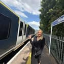 Amanda Martin MP watching the first re-nationalised train leave Hilsea station earlier this year