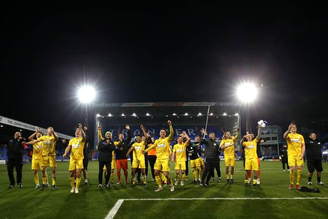 Last season's FA Cup dream makers - Chichester City applaud their fans after their second round defeat at Tranmere Rovers. Photo by Lewis Storey/Getty Images.