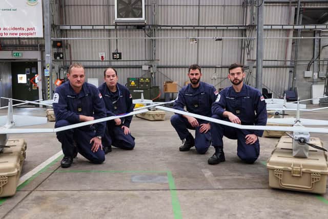 Some of the navy's 700X pictured along with their new Puma drones.