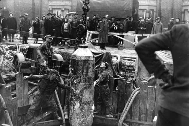 Recovery of bomb from Torrington Road, North End, Portsmouth. Dropped June 1941, recovered January 1946. Weight approx 2000lb. Picture: Courtesy of John Sadden.