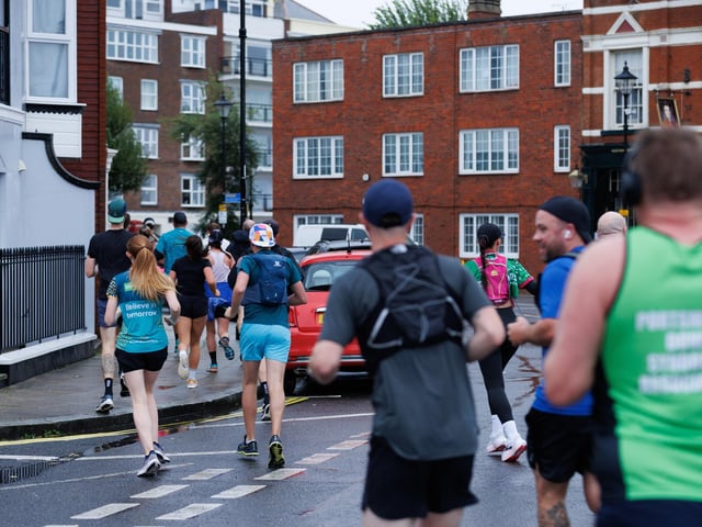 Runners braved the wet and windy conditions despite The Great South Run being cancelled.