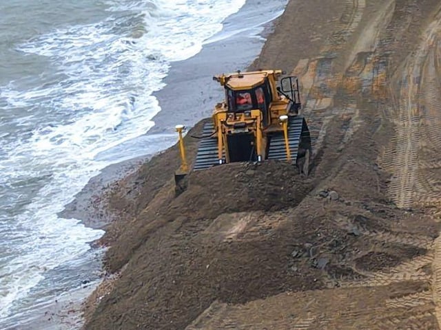 Yellow digger on Southsea Beach