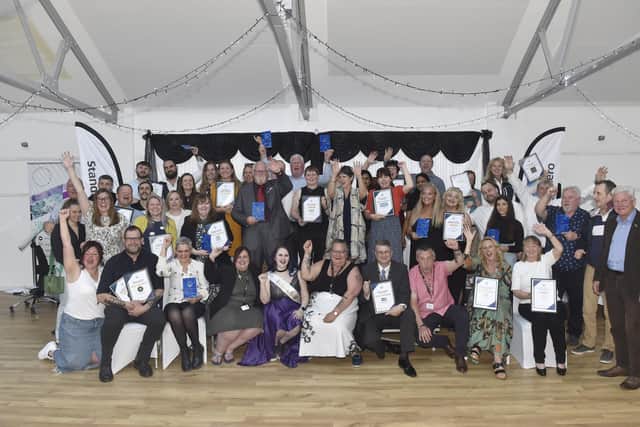 The award winners and commended businesses celebrate together onstage at the Gosport Business Awards 2024.