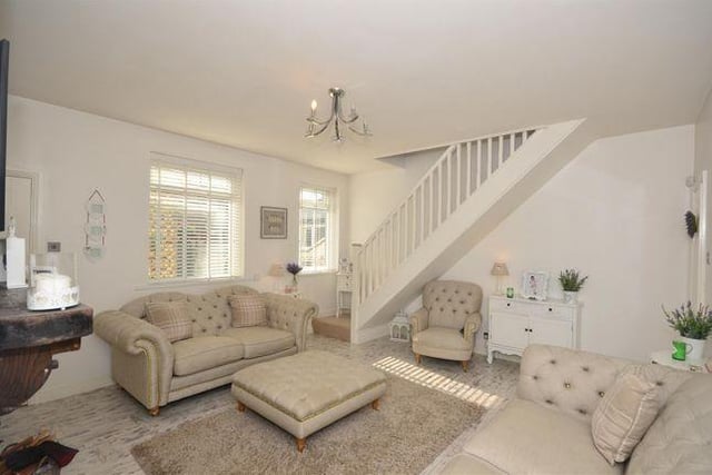 Described as a beautifully presented mid terraced cottage with an impressive loft conversion, this one bed cottage is on sale for £87,500 with Peter Heron Estate Agents.