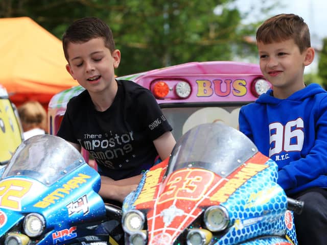 Kaiden Hopkins, eight, left, and Oliver Keen, seven at the Paulsgrove and Wymering Carnival 
Picture: Chris Moorhouse (jpns 250622-25)
