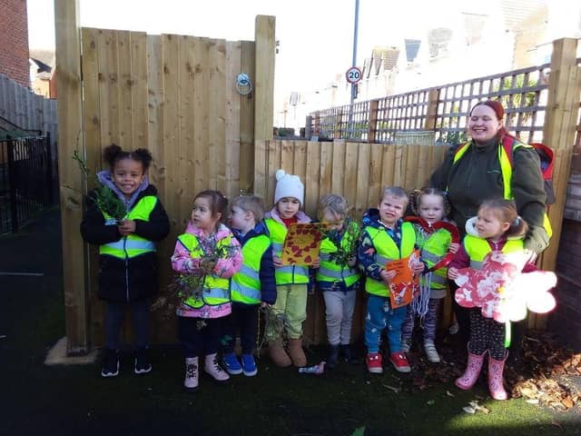Children at Tops Southsea nursery with their handmade gifts. 