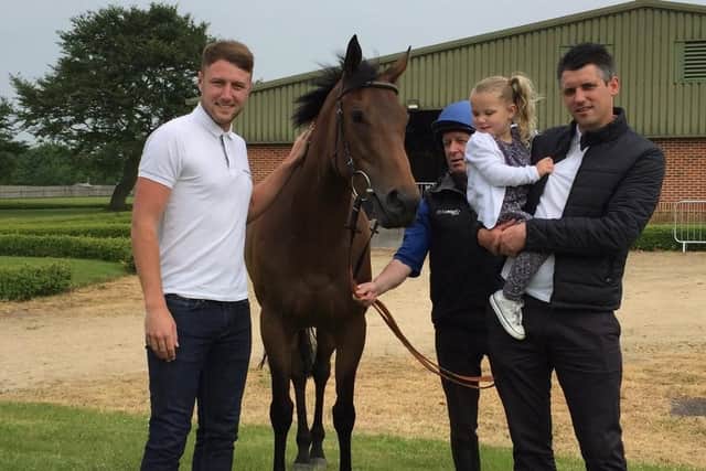 Louie Martin, left, with one of the former Non-League Racing syndicate horses, Diva Du Maquis, and AFC Portchester assistant manager Gav Spurway, right, who is also involved