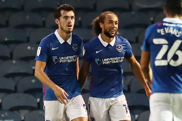 Marcus Harness, right, celebrates his second goal. Picture: Naomi Baker/Getty Images