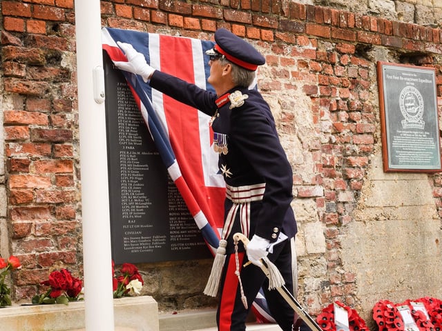 Pictured is: HM Lord-Lieutenant of Hampshire, Nigel Atkinson Esq. unveiling the new Falkland memorial. Picture: Keith Woodland (190621-202).
