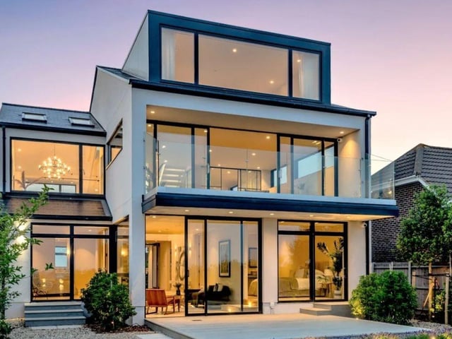 This property comes with four bedrooms, four bathrooms and three reception rooms.
