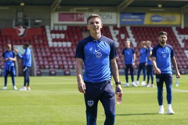 Tom Lowery and his new Pompey team-mates checking out the turf at Whaddon Road.