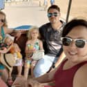 Back row, from left: Cheryl's sister Michelle Nicholls with Harley, her daughters Florence and Sienna and husband Shaun. Front row: Matt and Cheryl.