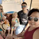 Back row, from left: Cheryl's sister Michelle Nicholls with Harley, her daughters Florence and Sienna and husband Shaun. Front row: Matt and Cheryl.