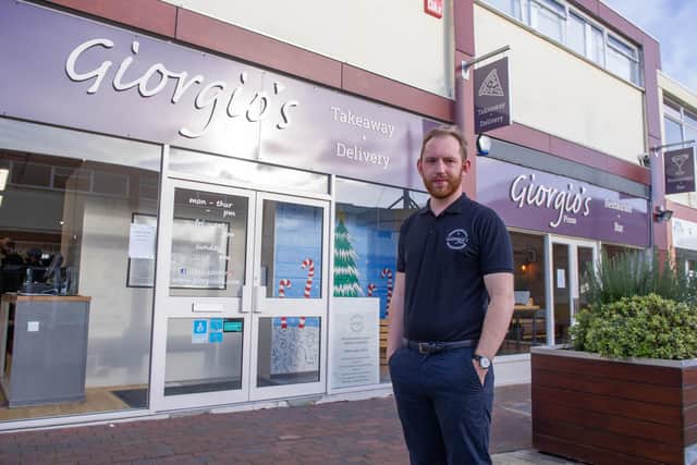 Giorgio s Pizza, Waterlooville, focused on deliveries last year and thrived as a result. They expanded and reopened as a restaurant, but are now seeing the same problems with cancellations as other businesses. Pictured: Co owner, George Goodrham, on Wednesday 8th December 2021. Photo: Habibur Rahman.