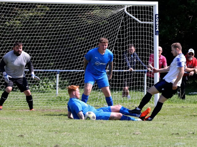 Paulsgrove (blue) v Clanfield. Picture: Sam Stephenson.