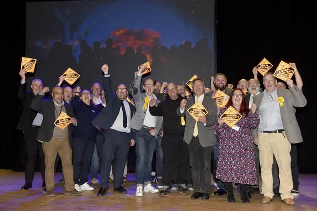 Pictured is: The Liberal Democrats celebrate their success after winning the most seats - but still have no overall control of the councilPicture: Sarah Standing (020524-1727)