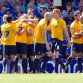 Oxford United celebrate their 4-1 win over Pompey in 2013