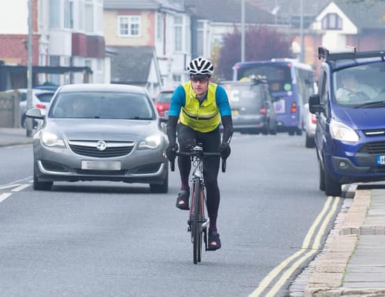 Pictured: Police officer Paul Farquharson on his bike patrolling Northern Parade, Portsmouth
Picture: Habibur Rahman