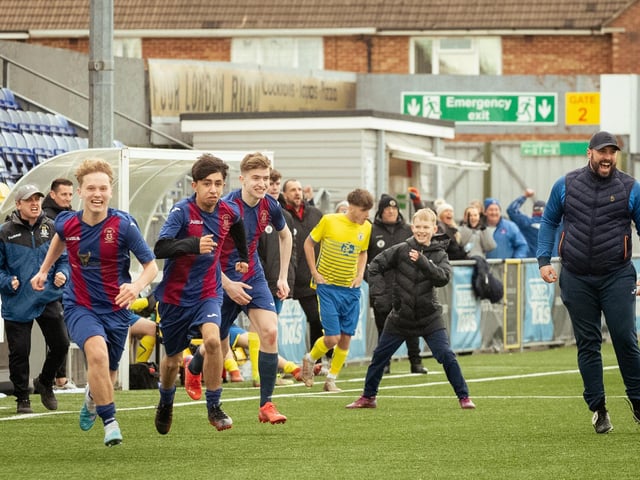 US Portsmouth players rush to celebrate their penalty shoot-out victory. Picture: Keith Woodland