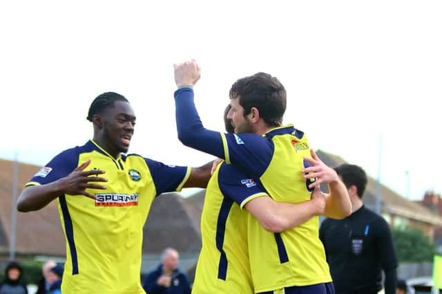 Billie Busari, left, is about to join Dan Wooden's goal celebration Picture: Tom Phillips