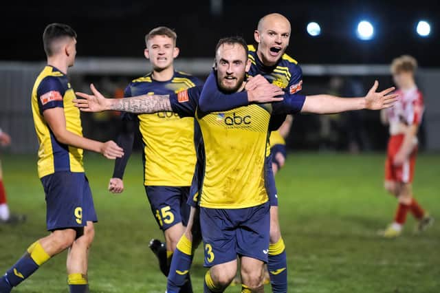 Elliott Turnbull celebrates grabbing Moneyfields' fifth and final goal in the Russell Cotes Cup quarter-final win over Lymington. Picture: Dave Bodymore
